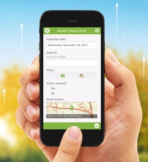 Field engineer completing an asset inspection on a mobile app